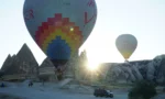 Gün doğumunda Kapadokya’da gezilecek yerler temalı balon manzarası